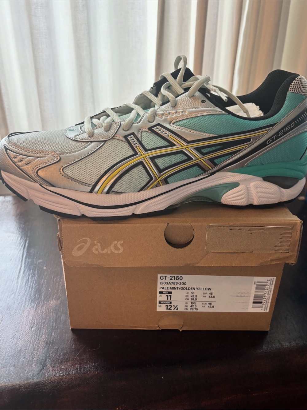 ASICS GT-2160 mens's Running Shoe in Pale Mint/Gold